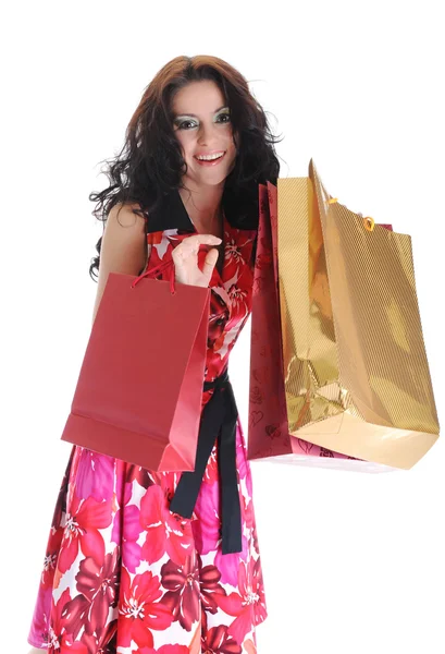 Радостная брюнетка красивая девушка с сумками — стоковое фото