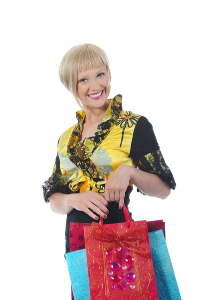 Beautiful young blonde with bags. — Stock Photo, Image