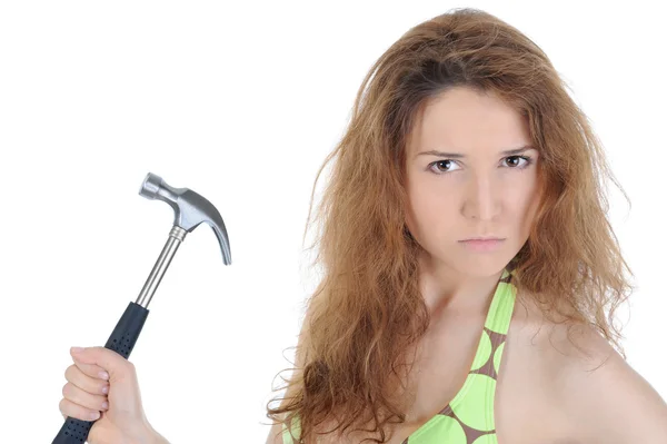 Portrait of a brunette with a hammer — Stock Photo, Image