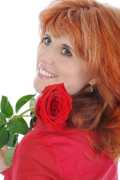 Roodharige meisje met een roos — Stockfoto