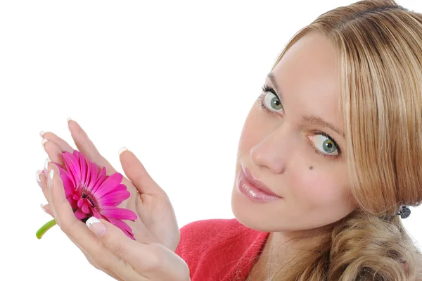 Mujer joven con flor en la mano —  Fotos de Stock