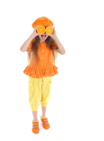 Funny girl with oranges. — Stock Photo, Image