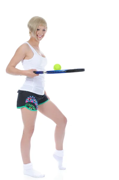 Vacker flicka med en tennisracket. — Stockfoto