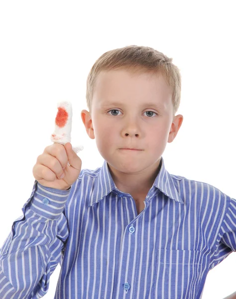 Siedmioletni chłopiec palcem bandażowane w sposób. — Zdjęcie stockowe