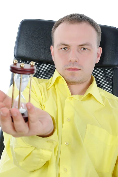 Businessman with hourglass in hand. — Stock Photo, Image
