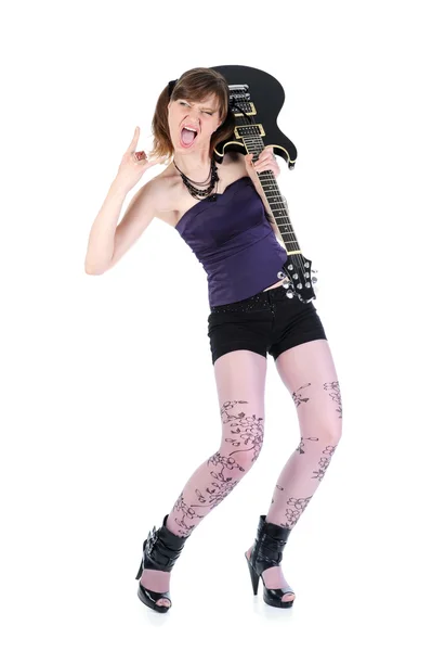 Energetic girl with a black guitar in his hand. — Stock Photo, Image