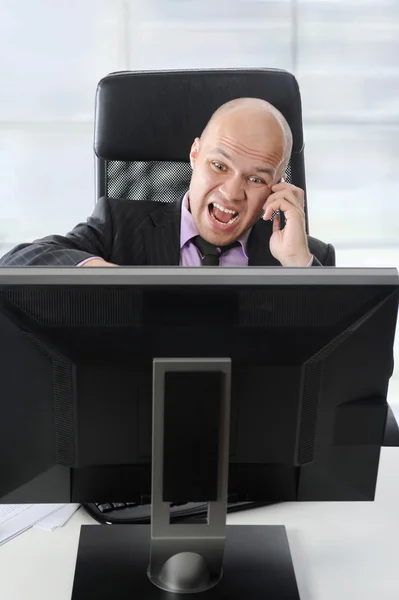 Nervös affärsman i office — Stockfoto