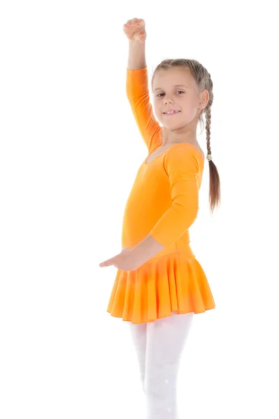 美丽的芭蕾舞女演员穿着橙色跳舞. — 图库照片