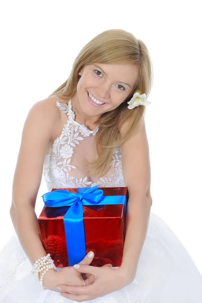 Bride hugging gift red box — Stock Photo, Image