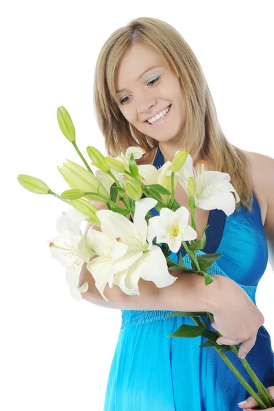 Szczęśliwa kobieta z lilią w dłoni — Zdjęcie stockowe
