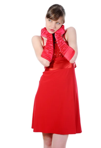 Mooi meisje in de rode jurk. Stockafbeelding