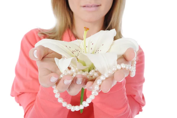 Lily in hands — Stock Photo, Image