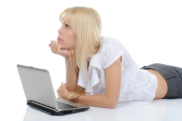 Blonde with a computer — Stockfoto