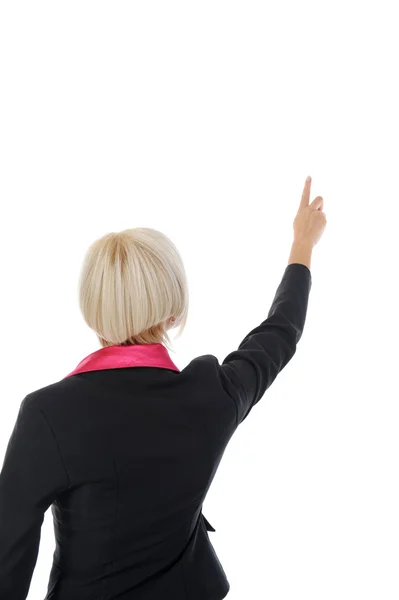 Businesswoman points finger up — Stock Photo, Image