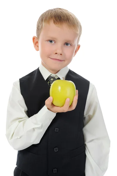 Menino segura uma maçã — Fotografia de Stock