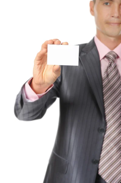 Businessman in suit handing a blank — Stock Photo, Image