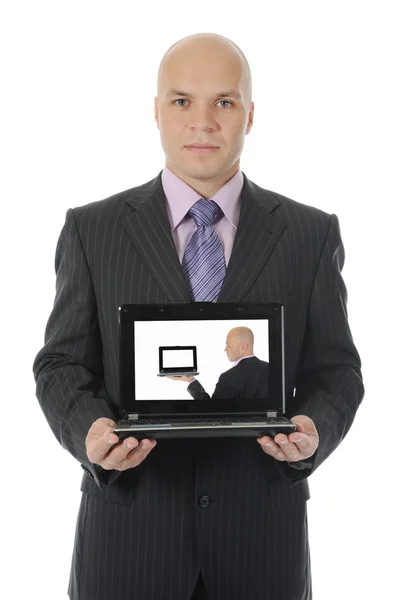 Uomo d'affari con un portatile aperto — Foto Stock