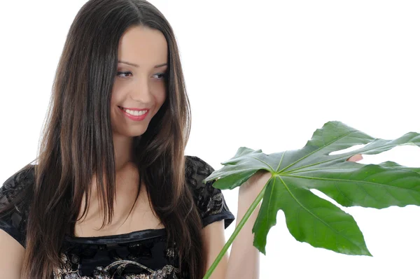 Woman with green leaf — Stock Photo, Image