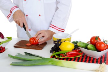 Chef cuts the vegetables