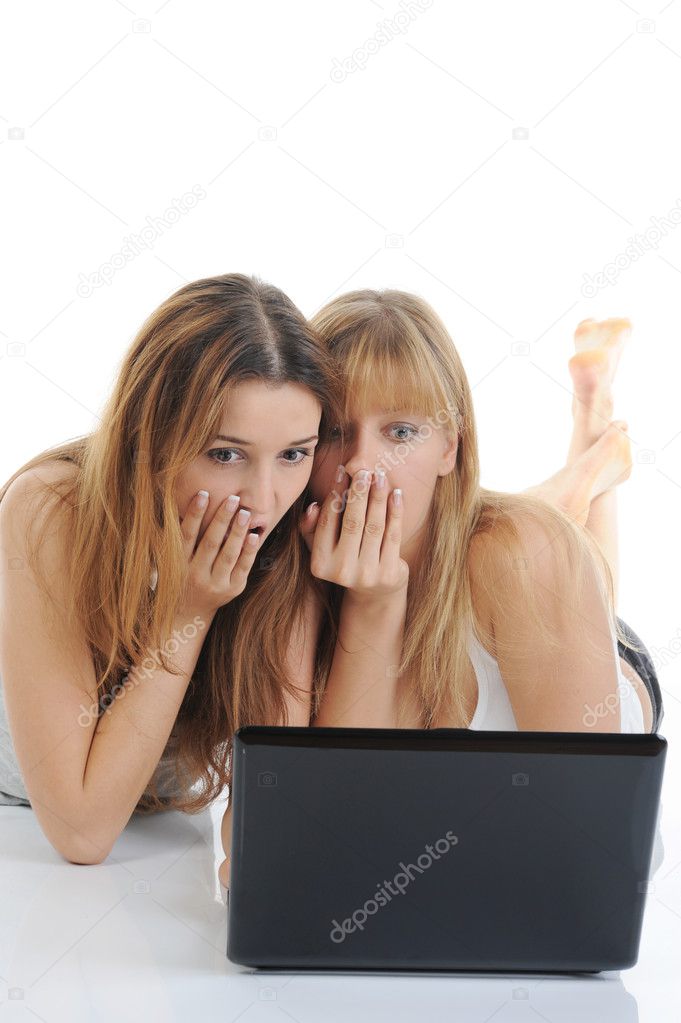 Two friends with a laptop.