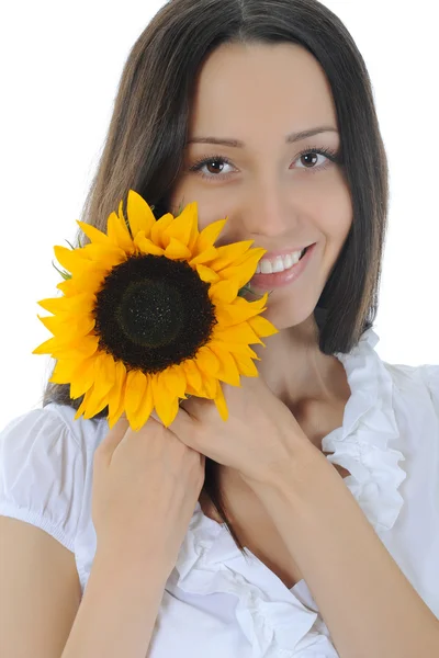 Brünette mit einer sonnenblume — Stockfoto