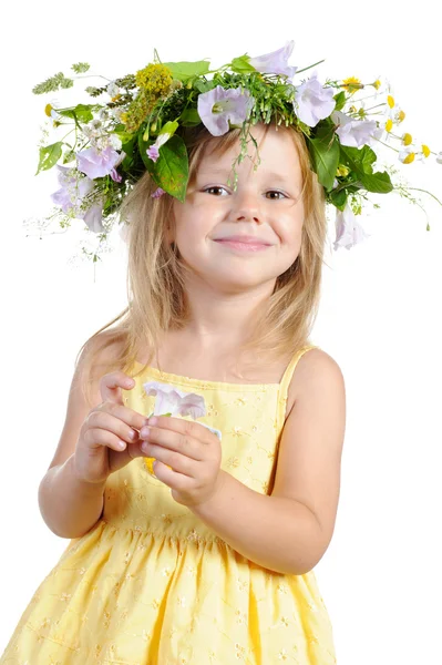 Girl with a wreath of flowers. — Stock Photo, Image