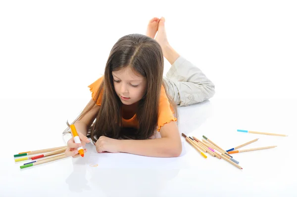 Long-haired girl draws — Stock Photo, Image