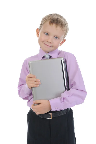 Смішний маленький хлопчик з ноутбуком — стокове фото