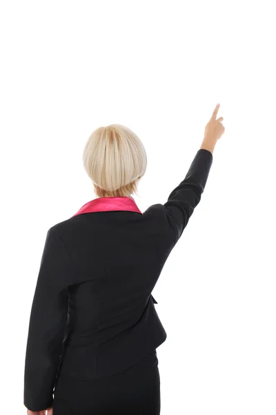 Businesswoman points finger up — Stock Photo, Image