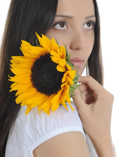 Brünette mit einer sonnenblume — Stockfoto