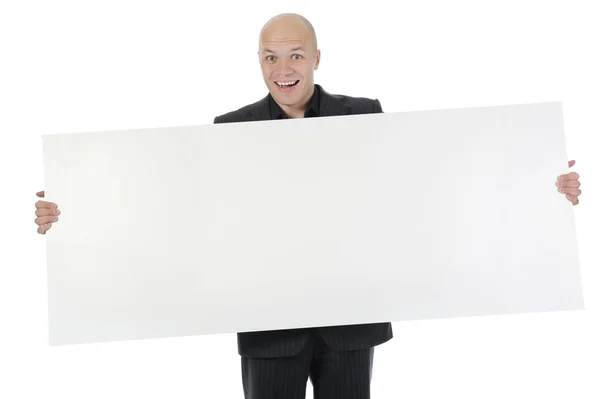 Young man holding blank sheet — Stock Photo, Image