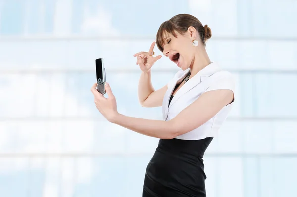 Happy girl photographed themselves on the phone. — Stock Photo, Image