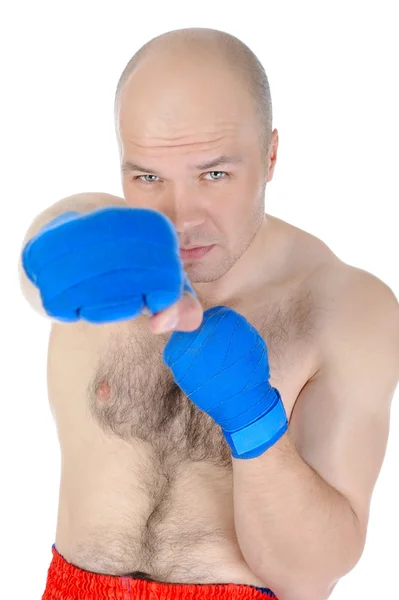 Experienced adult fighter punches during training. — Stock Photo, Image