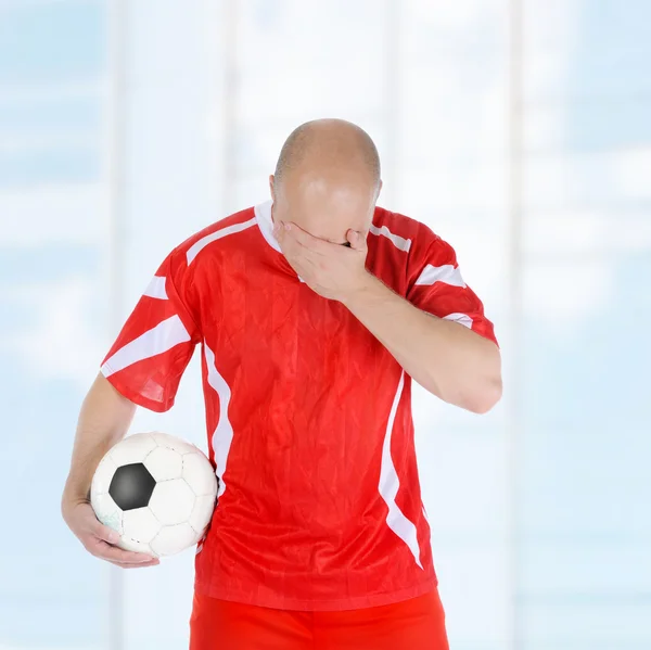 Upset soccer player — Stock Photo, Image