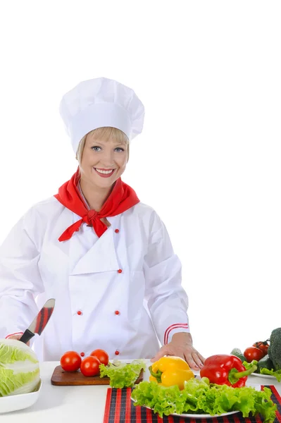 Ευτυχισμένο σεφ στολές στην προετοιμασία μια υγιή σαλάτα. — Φωτογραφία Αρχείου