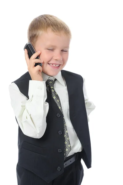 Chłopiec rozmawiający przez telefon. — Zdjęcie stockowe