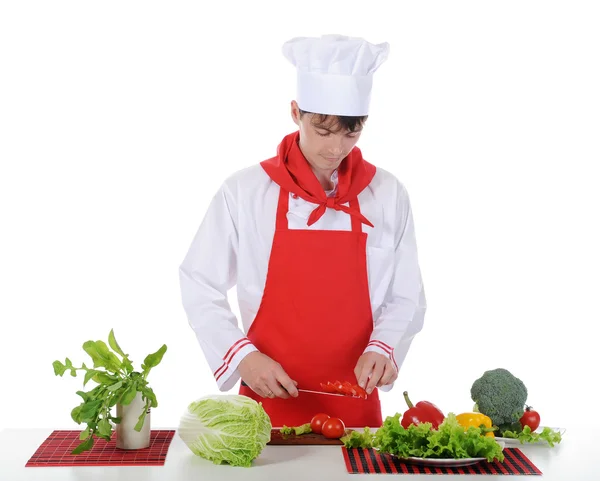 Chef e pomodoro sul coltello . — Foto Stock