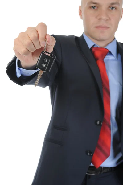 Businessman gives the keys to the car Royalty Free Stock Images