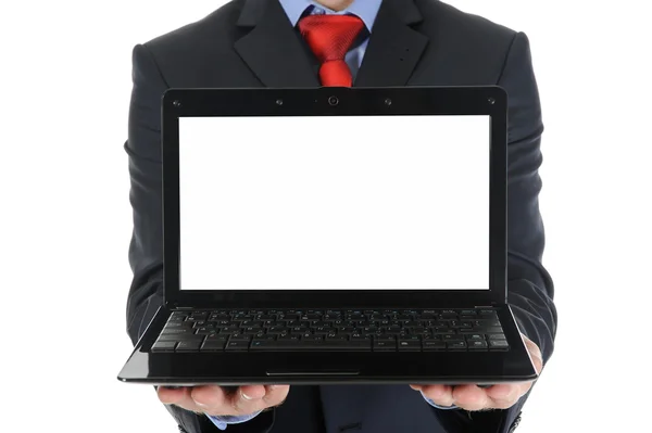 Podnikatel drží otevřený laptop — Stock fotografie