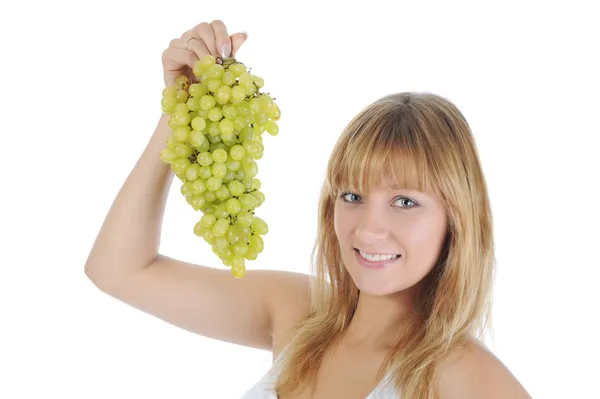Дівчина з зеленим виноградом . — стокове фото