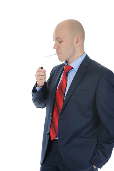 Affärsman i svart kostym hålla en cigarett — Stockfoto