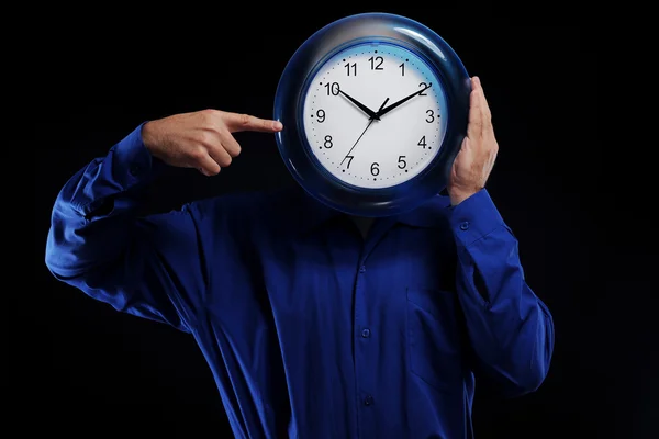 Muž drží hodin — Stock fotografie