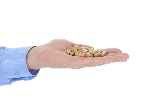 A férfi kezében tabletta — Stock Fotó