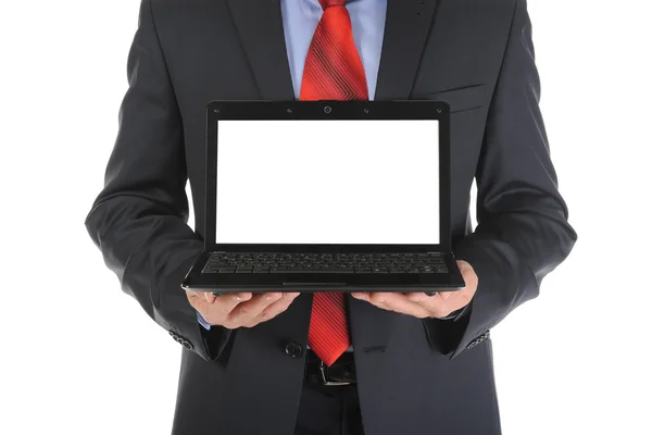 Empresário segurando um laptop aberto — Fotografia de Stock