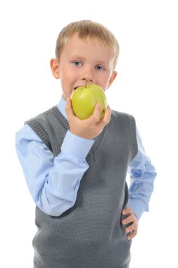 Boy eats an apple clipart