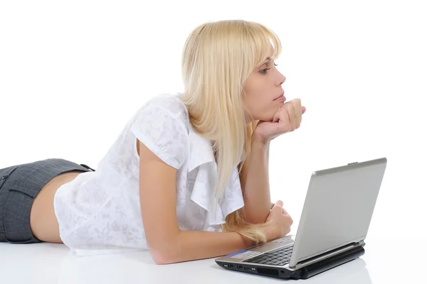 Blonde with a computer Stock Image