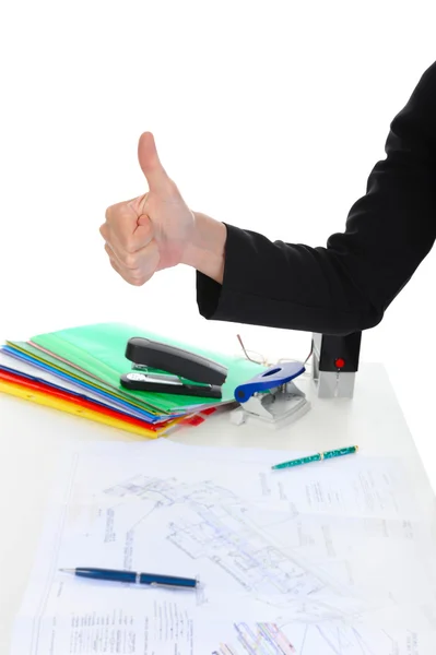 Woman's hand with his thumb up over the table with the documents — Stock Photo, Image