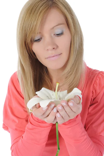 Kobieta z lilią w dłoni — Zdjęcie stockowe