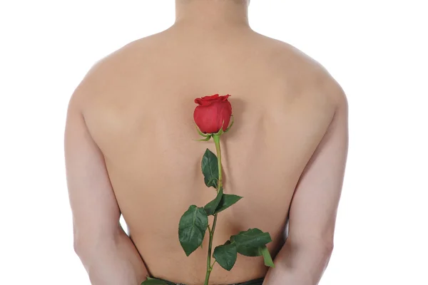 Чоловік тримає червону троянду — стокове фото