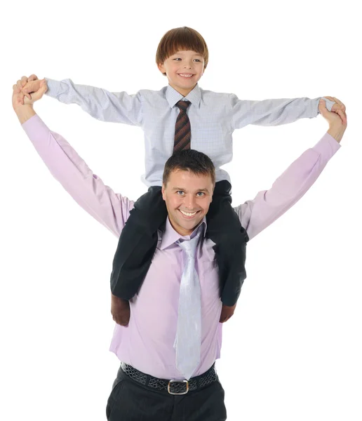 Glücklicher Sohn sitzt auf Vater — Stockfoto